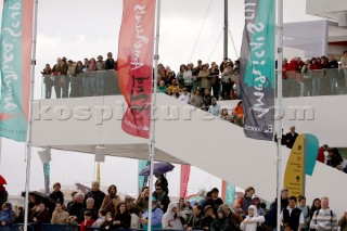 Crowds of spectators line the new buildings in Port Americas Cup in Valencia