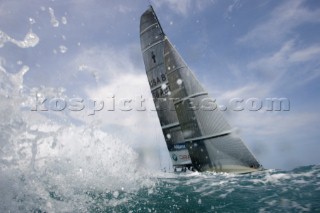 BMW Oracle crashing through a wave