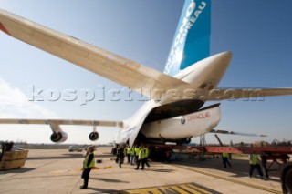 BMW Americas Cup yacht is loaded onboard a Russian cargo plane in transportation