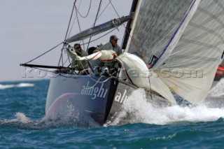 Alinghi SUI91 at the first top mark rounding of race six of the Louis Vuitton Act 13. 7/4/2007