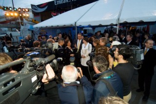 NZ prime Minister Helen Clark and Rita Barbera Mayor of Valencia are surrounded by an international media huddle at the Tourisim New Zealand Cultural Bar B Que at the Emirates Team New Zealand base in Valencia.13/4/2007