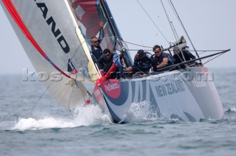 Emirates Team New Zealand NZL92 rounds the first top mark behind Mascalzone Latino ITA99 on Round Ro