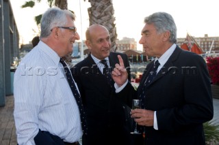 VALENCIA, SPAIN - May 14th: Patrizio Bertelli the owner of the Luna Rossa Prada Challenge (left) meets Mr Cattani (centre) and Bernard dAlessandri (right), Commodore of the Yacht Club de Monaco, at the exclusive Tuiga Party during the Louis Vuitton Cup Semi Finals.