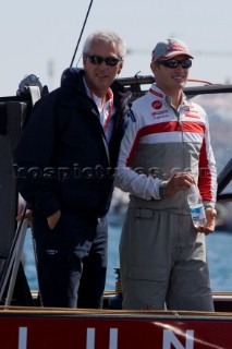 VALENCIA, SPAIN - May 18th:  Marco Tonchetti Provera (left) talks with James Spithill onboard Luna Rossa Prada Challenge (ITA) as she leaves to race against BMW Oracle (USA) in the fourth semi final match of the Louis Vuitton Cup on May 18th 2007. Prada wins 3-1.