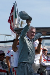 VALENCIA, SPAIN - May 18th: ©Carlo Croce, Commodore of the Yacht Club Italiano waves to Luna Rossa Prada Challenge (ITA) as she leaves to race against BMW Oracle (USA) in the fourth semi final match of the Louis Vuitton Cup on May 18th 2007. Prada wins 3-1.