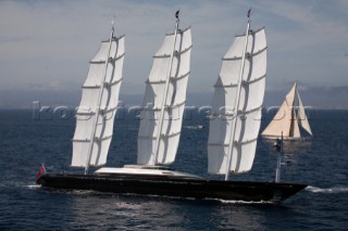 PALMA, MAJORCA - JUNE 17TH:  The oldest sailing yacht at the event Lulworth built in 1920 appears behind the contemporary masts and sails of the largest yacht Maltese Falcon (288ft) sailing on the Fortis Day of the Superyacht Cup Ulysse Nardin on June 17th 2007. Fifty-two of the worlds largest and most expensive sailing superyachts have gathered in Majorca for three days of sailing and social events.