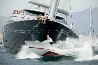 PALMA, MAJORCA - JUNE 17TH:  A spectator boat passes dangerously close in front of  Maltese Falcon owned by Tom Perkins on Fortis Day of the Superyacht Cup Ulysse Nardin on June 17th 2007. Fifty-two of the worlds largest and most expensive sailing superyachts have gathered in Majorca for The Superyacht Cup Ulysse Nardin 2007, including three days of sailing and social events.