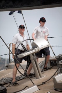 PALMA, MAJORCA - JUNE 18TH:  The young son of the owner of Ghost takes the helm whilst sailing on Astilleros di Majorca Day of the Superyacht Cup Ulysse Nardin on June 18th 2007. Fifty-two of the worlds largest and most expensive sailing superyachts have gathered in Majorca for The Superyacht Cup Ulysse Nardin 2007, including three days of sailing and social events.