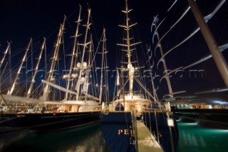 PALMA, MAJORCA - JUNE 18TH: The superyachts with their tall masts floodlit at midnight on Astilleros di Majorca Day of the Superyacht Cup Ulysse Nardin on June 18th 2007. Fifty-two of the worlds largest and most expensive sailing superyachts have gathered in Majorca for The Superyacht Cup Ulysse Nardin 2007, including three days of sailing and social events.