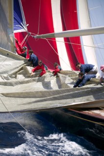 PALMA, MAJORCA - JUNE 19TH:  The foredeck crew crew drop the sails on the J-Class Ranger sailing on New Zealand Millenium Day of the Superyacht Cup Ulysse Nardin on June 19th 2007. Fifty-two of the worlds largest and most expensive sailing superyachts have gathered in Majorca for The Superyacht Cup Ulysse Nardin 2007, including three days of sailing and social events.