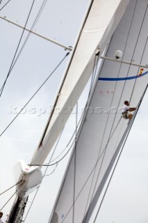 The bowman on Hamilton II inspects the genoa battens sailing on Astilleros di Majorca Day of the Superyacht Cup Ulysse Nardin 2007 in Palma, Majorca