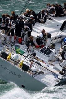 COWES, ENGLAND - August 13th: The 100ft canting keel super maxi ICAP Leopard 3 owned by Mike Slade (UK) leads the fleet of nearly 300 racing yachts as she leaves Cowes on the Isle of Wight to begin the 605 mile Rolex Fastnet Race on August 13th 2007. The yachts race to the Fastnet Rock off southern Ireland and back to the finish in Plymouth, England.