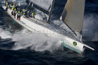 The super maxi Rambler racing around the Fastnet Rock Lighthouse chased by ICAP Leopard during the Rolex Fastnet Race 2007 (Editorial Use only)