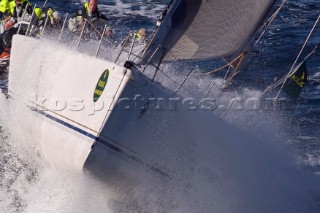 The super maxi Rambler racing around the Fastnet Rock Lighthouse chased by ICAP Leopard during the Rolex Fastnet Race 2007 (Editorial Use only)