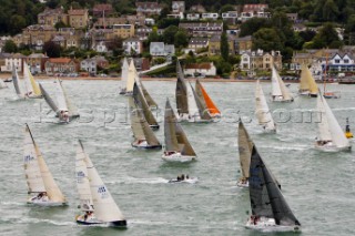 COWES, ENGLAND - August 13th: The fleet of nearly 300 racing yachts leaves Cowes on the Isle of Wight to begin the 605 mile Rolex Fastnet Race on August 13th 2007. The yachts race to the Fastnet Rock off southern Ireland and back to the finish in Plymouth, England.