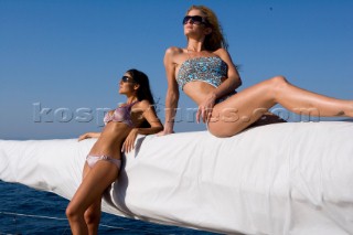 Topless woman on a boat