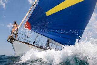 Glamorous female lifestyle model onboard a sailing yacht in the Mediterranean