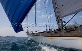 Glamorous female lifestyle model onboard a sailing yacht in the Mediterranean