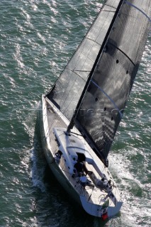 Glamorous female lifestyle model onboard a sailing yacht in the Mediterranean