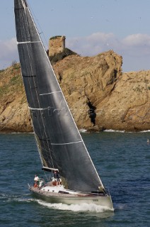 Glamorous female lifestyle model onboard a sailing yacht in the Mediterranean