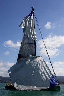 Glamorous female lifestyle model onboard a sailing yacht in the Mediterranean