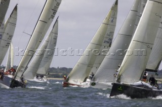 COWES, UK - June 30th: Crews struggle in testing conditions on Day 1 of the Rolex Commodores Cup held in Cowes, Isle of Wight. The French Blue Team lead the event by half a point. The Rolex Commodores Cup is held biannually in the UK and is the premier team racing event in the UK for big racing yachts. It is run by the Royal Ocean Racing Club. (Photo by Mike Jones/kospictures.com).