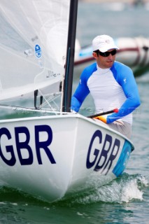 Qingdao, China, 20080807: 2008 OLYMPICS - Practice Race at Olympic Sailing Regatta before the real deal begins on Saturday. Ben Ainslie (GBR) - Finn Class.  (No sale to Denmark)