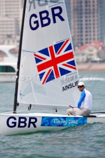 Qingdao, China, 20080807: 2008 OLYMPICS - Practice Race at Olympic Sailing Regatta before the real deal begins on Saturday. Ben Ainslie (GBR) - Finn Class.  (No sale to Denmark)