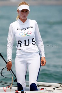 Qingdao, China, 20080807: 2008 OLYMPICS - Practice Race at Olympic Sailing Regatta before the real deal begins on Saturday. Ekatarina Skudina (RUS) - Yngling Class.  (No sale to Denmark)