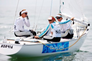 Qingdao, China, 20080807: 2008 OLYMPICS - Practice Race at Olympic Sailing Regatta before the real deal begins on Saturday. Siren Sundby/Alexandra Koefoed/Lise Birgitte Frederiksen (NOR) - Yngling Class.  (No sale to Denmark)