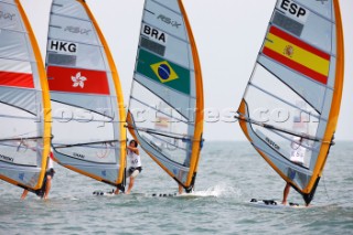 Qingdao, China, 20080807: 2008 OLYMPICS - Practice Race at Olympic Sailing Regatta before the real deal begins on Saturday. Yin Chan (HKG) - RS:X Class Men.  (No sale to Denmark)