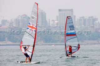 Qingdao, China, 20080807: 2008 OLYMPICS - Practice Race at Olympic Sailing Regatta before the real deal begins on Saturday. Bryony Shaw (GBR) . RS:X Class Women.  (No sale to Denmark)