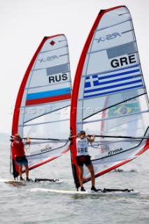 Qingdao, China, 20080807: 2008 OLYMPICS - Practice Race at Olympic Sailing Regatta before the real deal begins on Saturday. Antonia Athina (GRE) - RS:X Class Women.  (No sale to Denmark)