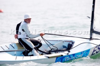 Qingdao, China, 20080809: 2008 OLYMPICS - racing in the Olympic Sailing Event. Rafa Trujillo (ESP) - Finn Class.  (no sale to Denmark)