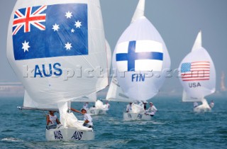 Qingdao, China, 20080809: 2008 OLYMPICS - first day of racing in the Olympic Sailing Event. WEIR Krystal/GOJNICH Karyn/FARRELL Angela win their first race - Yngling Class.  (no sale to Denmark)