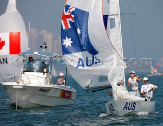 Qingdao, China, 20080809: 2008 OLYMPICS - first day of racing in the Olympic Sailing Event. WEIR Krystal/GOJNICH Karyn/FARRELL Angela win their first race - Yngling Class.  (no sale to Denmark)