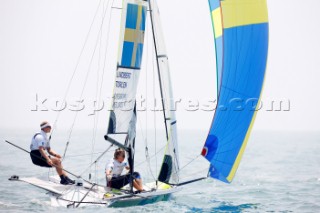 Qingdao, China, 20080809: 2008 OLYMPICS - first day of racing in the Olympic Sailing Event. Jonas Lindberg/Kalle Torlen (SWE) - 49er Class. (no sale to Denmark)