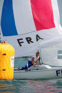 Qingdao, China, 20080809: 2008 OLYMPICS - first day of racing in the Olympic Sailing Event. le HELLEY Anne/LEPESANT Catherine/GERECHT Julie (FRA) - Yngling Class.  (no sale to Denmark)