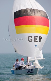 Qingdao, China, 20080809: 2008 OLYMPICS - first day of racing in the Olympic Sailing Event. SCHUEMANN Ulli/HOEPFNER Ute/BLECK Julia (GER) - Yngling Class.  (no sale to Denmark)