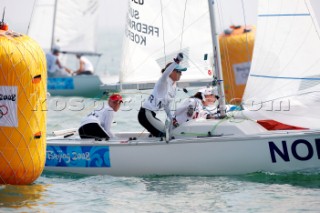 Qingdao, China, 20080809: 2008 OLYMPICS - first day of racing in the Olympic Sailing Event. SUNDBY Siren/FREDRIKSEN Lise Birgitte/KOEFOED Alexandra - Yngling Class.   (no sale to Denmark)