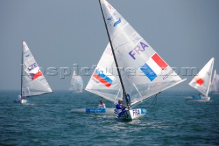 Qingdao, China, 20080809: 2008 OLYMPICS - first day of racing in the Olympic Sailing Event. FLORENT Guillaume (FRA) - Finn Class.   (no sale to Denmark)