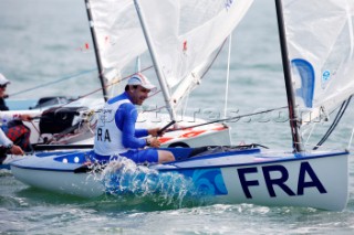 Qingdao, China, 20080809: 2008 OLYMPICS - first day of racing in the Olympic Sailing Event. FLORENT Guillaume - Finn Class.   (no sale to Denmark)