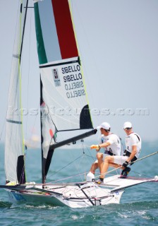 Qingdao, China, 20080810: 2008 OLYMPICS - second day of racing in the Olympic Sailing Event. Pietro Sibello/Gianfranco Sibello (ITA) -  49er Class.   (no sale to Denmark)