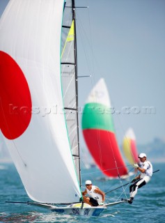 Qingdao, China, 20080810: 2008 OLYMPICS - second day of racing in the Olympic Sailing Event. Akira Ishibashi/Yukio Makino (JPN) - 49er Class.   (no sale to Denmark)