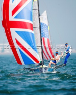 Qingdao, China, 20080810: 2008 OLYMPICS - second day of racing in the Olympic Sailing Event. Stevie Morrison/Ben Rhodes (GBR) - 49er Class.  (no sale to Denmark)