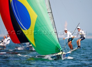 Qingdao, China, 20080810: 2008 OLYMPICS - second day of racing in the Olympic Sailing Event. Andre Fonseca/Rodrigo Duarte (BRA) - 49er Class.   (no sale to Denmark)