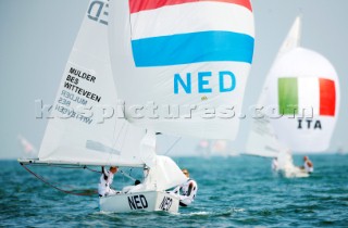 Qingdao, China, 20080810: 2008 OLYMPICS - second day of racing in the Olympic Sailing Event. Mandy Mulder/Annemieke Bes/Merel Witteveen (NED) - Yngling Class.   (no sale to Denmark)