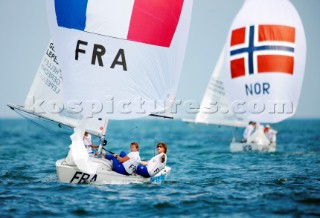 Qingdao, China, 20080810: 2008 OLYMPICS - second day of racing in the Olympic Sailing Event. Anne Le Helley/Catherine Lespant/Julie Gerecht (FRA) - Yngling Class.   (no sale to Denmark)