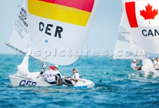 Qingdao, China, 20080810: 2008 OLYMPICS - second day of racing in the Olympic Sailing Event. Ulli Schuemann/Ute Hoepfner/Julia Bleck (GER) - Yngling Class.   (no sale to Denmark)