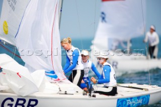 Qingdao, China, 20080810: 2008 OLYMPICS - second day of racing in the Olympic Sailing Event. Sarah Ayton/Sarah Webb/Pippa Wilson (GBR) - Yngling Class.   (no sale to Denmark)